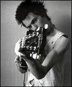 _179218_sid_vicious_and_bass_guitar.jpg