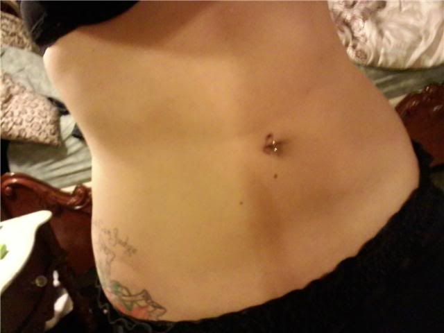 migrated navel piercing. re piercing belly button.