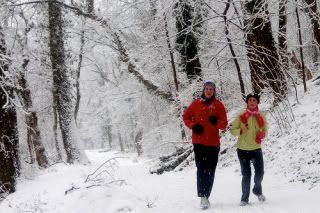 Couple Running in Snow