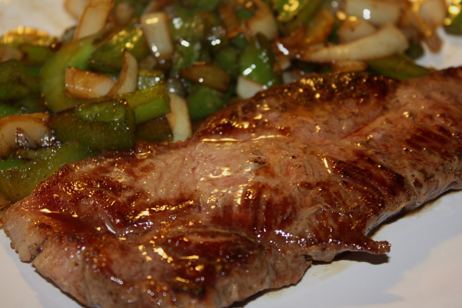 Steak with onions and peppers