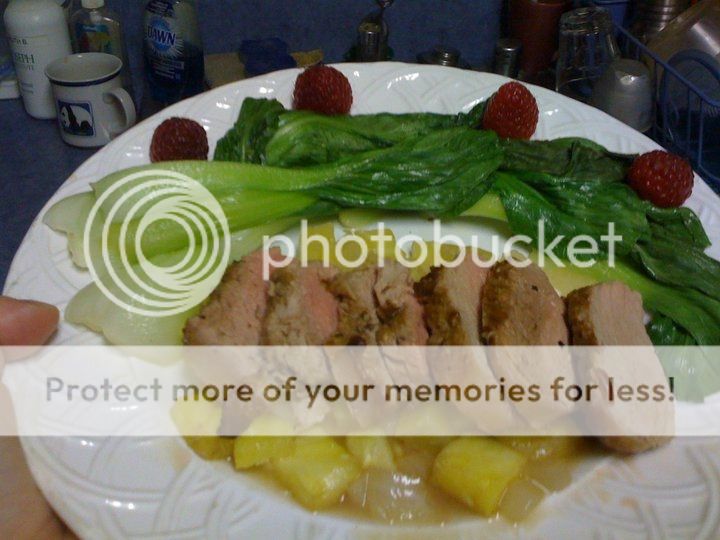 Ginger garlic pork loin over pineapple sauteed with onions and garlic; side of steamed bok choy and  raspberries