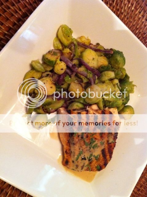 Grilled salmon with lemon coconut cream sauce with Roasted brusselsprouts and red onion